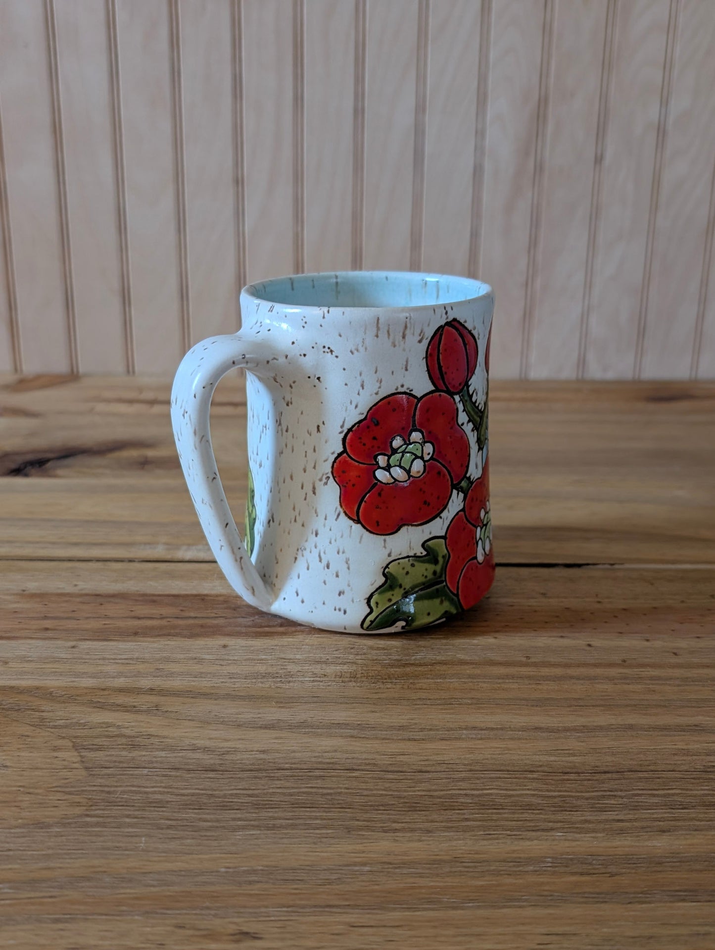 Potion bottle with skull and poppies mug two