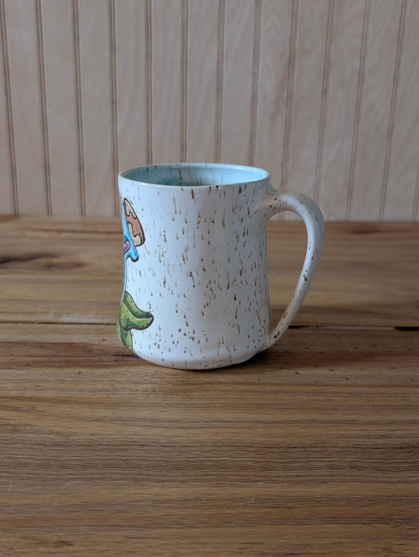 cat and fishbone potion bottle