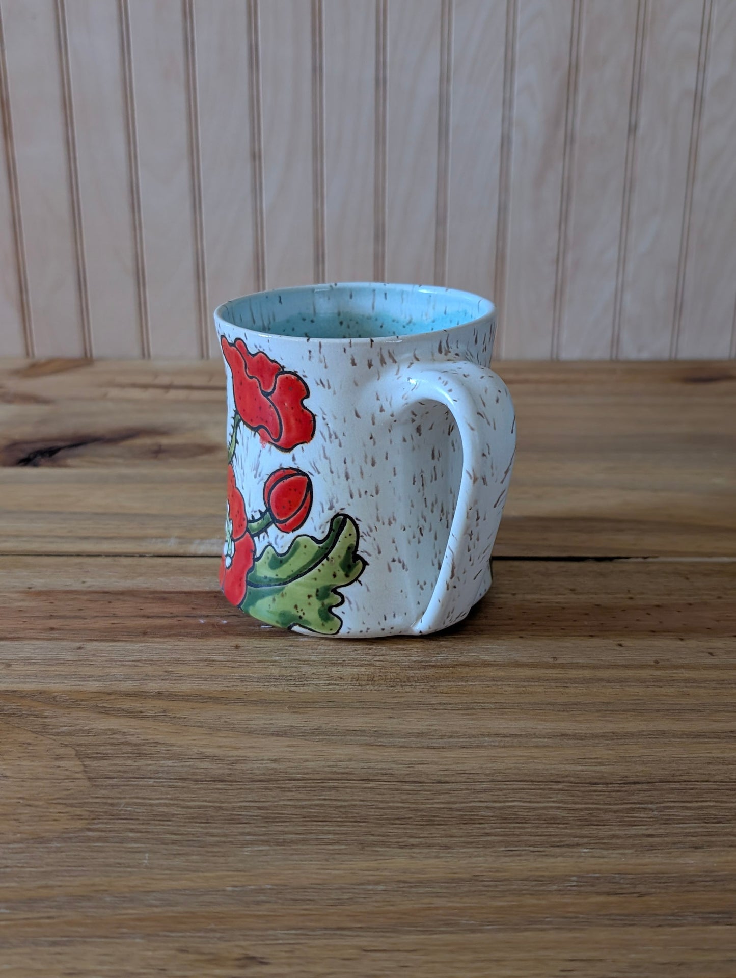 potion bottle with skull and poppies mug