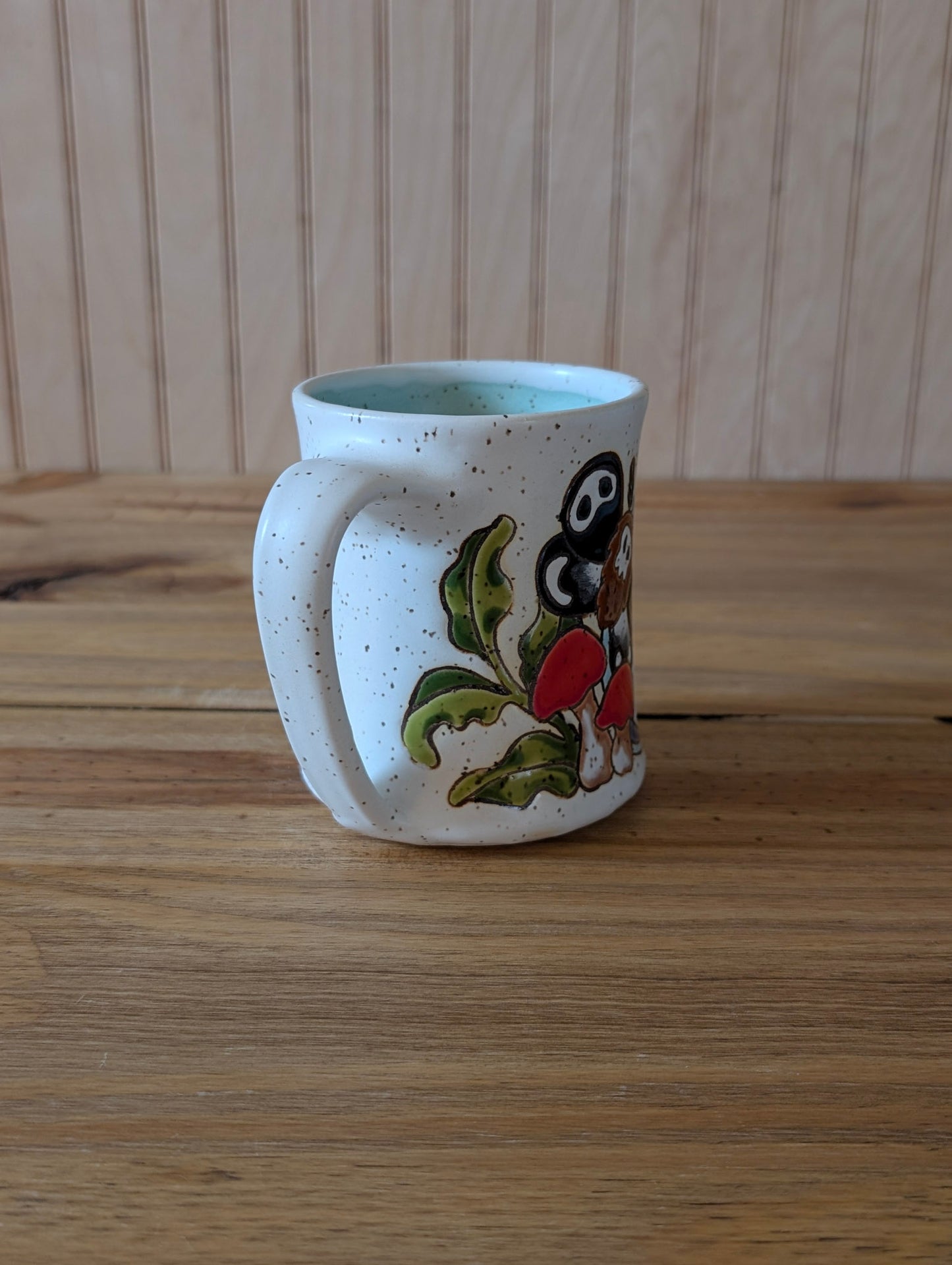 potion bottle with ghost and death's head hawk-moth