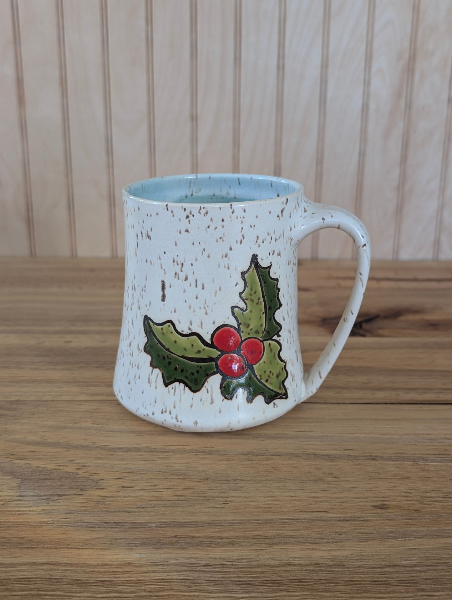 holly emblem mug two