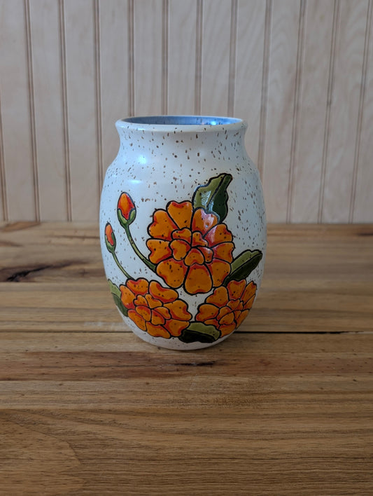 orange flower vase