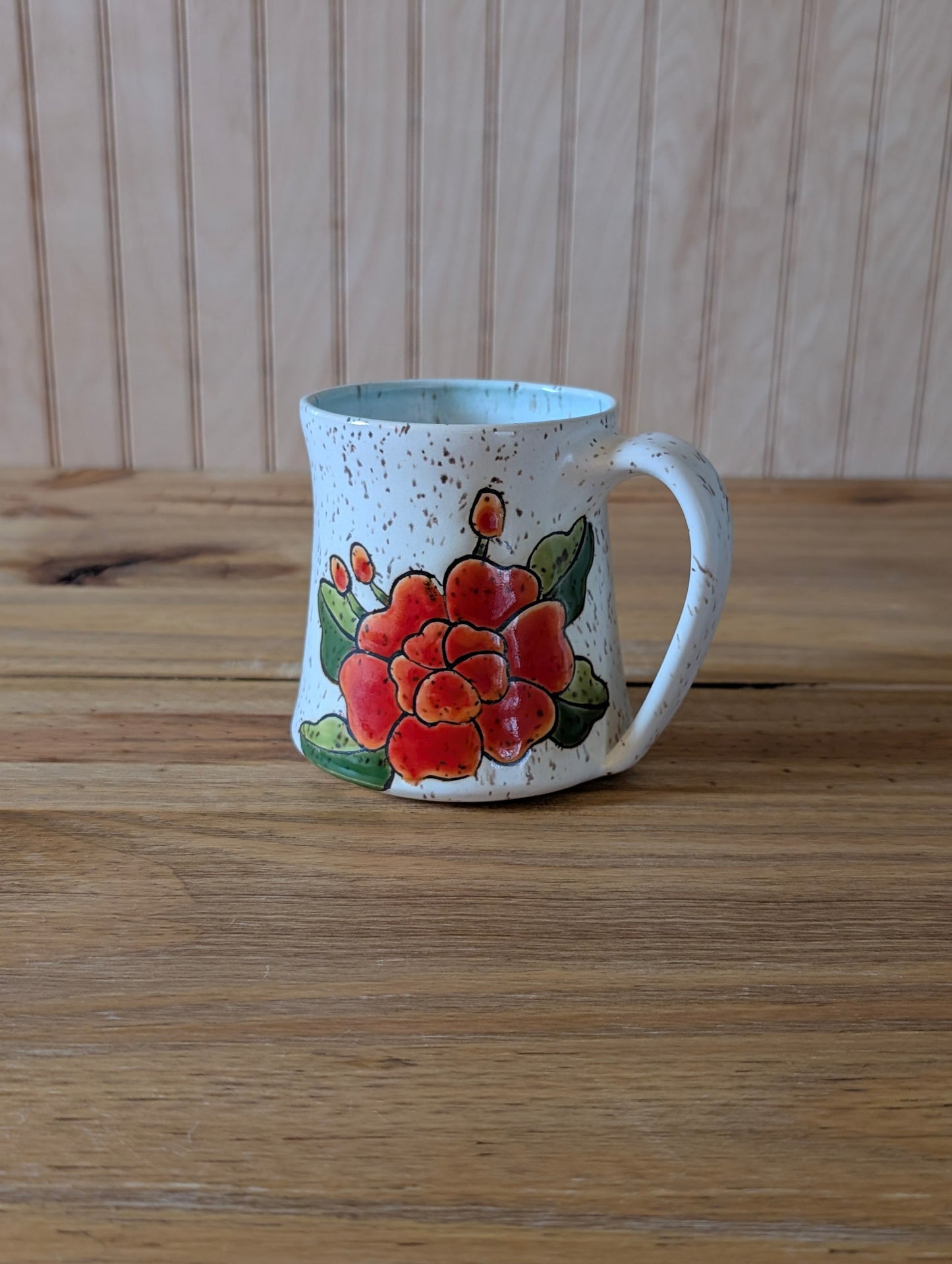 red flower mug