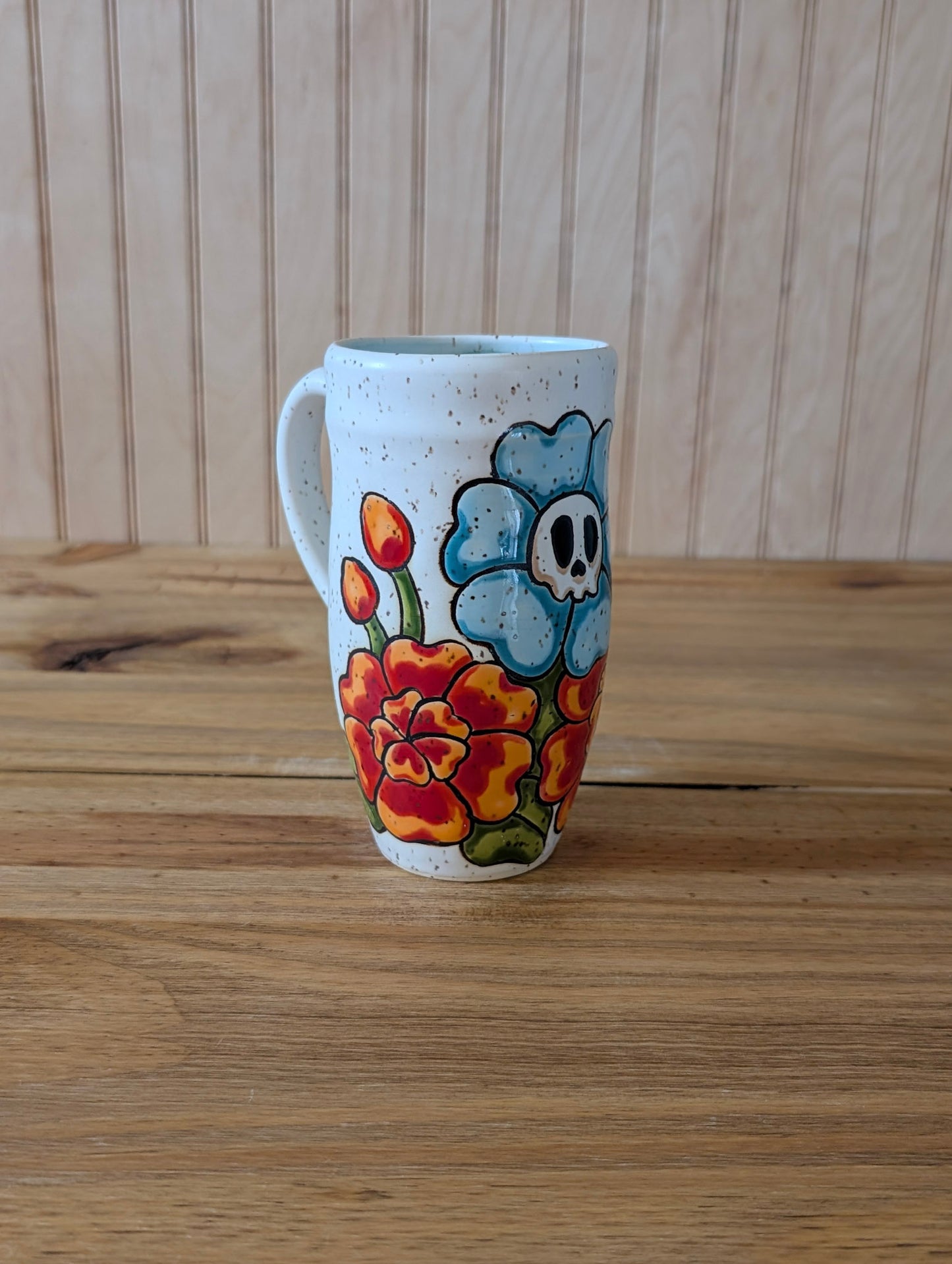 skull and flowers tumbler