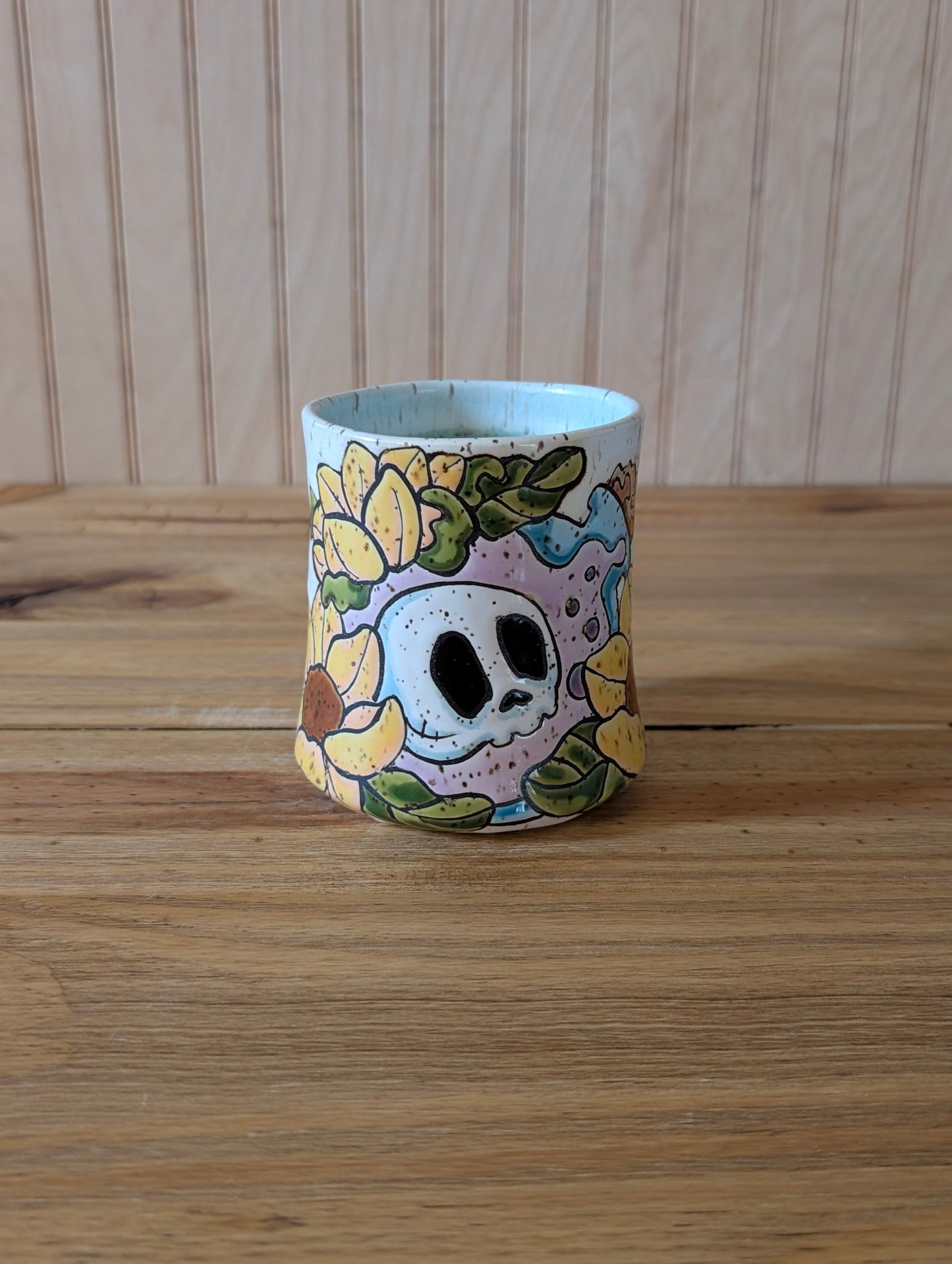 Potion bottle with skull with sunflower mug