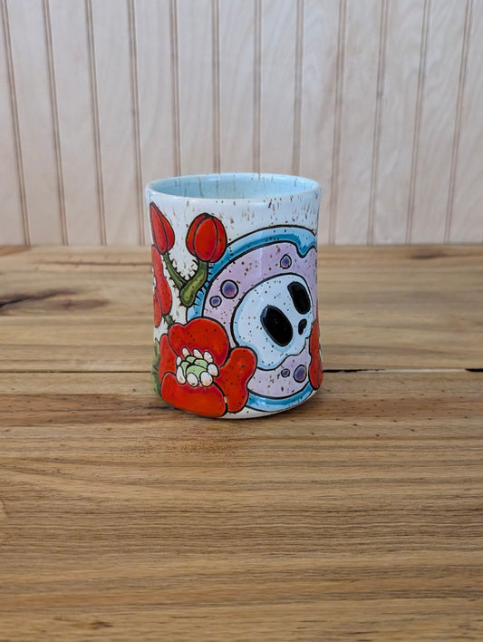 Potion bottle with skull and poppies mug two