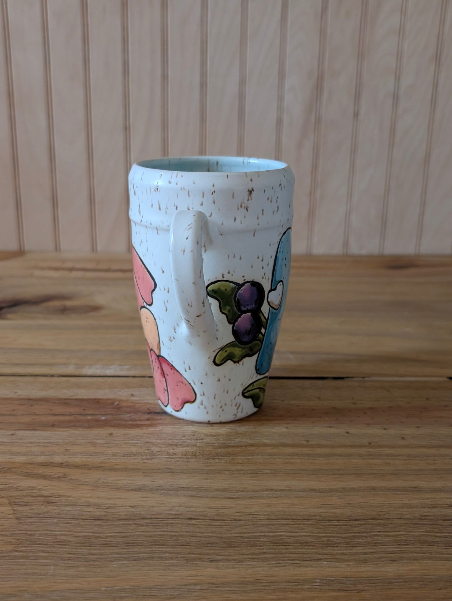 floral and mushroom wraparound design mug