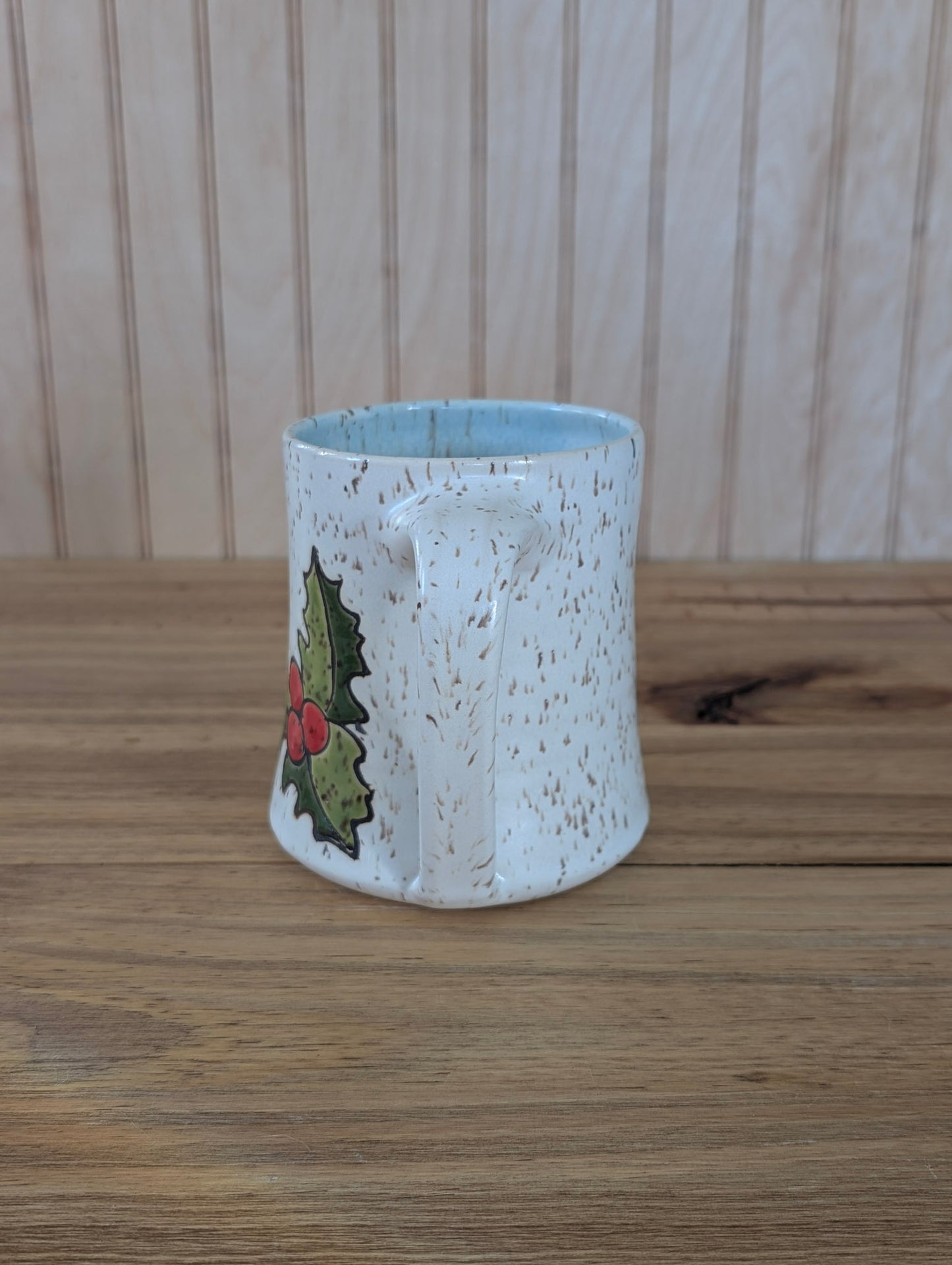 holly emblem mug two