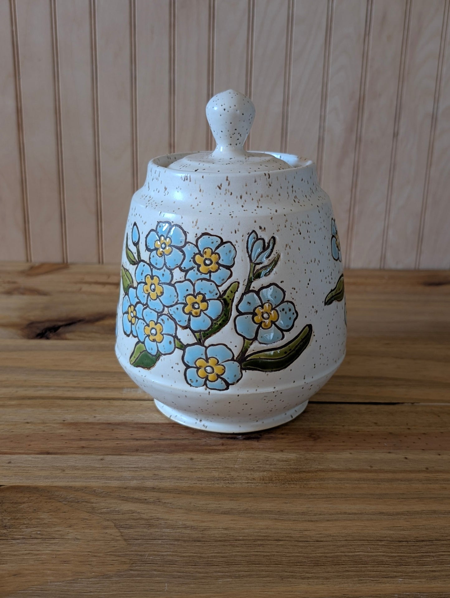 forget me not canister