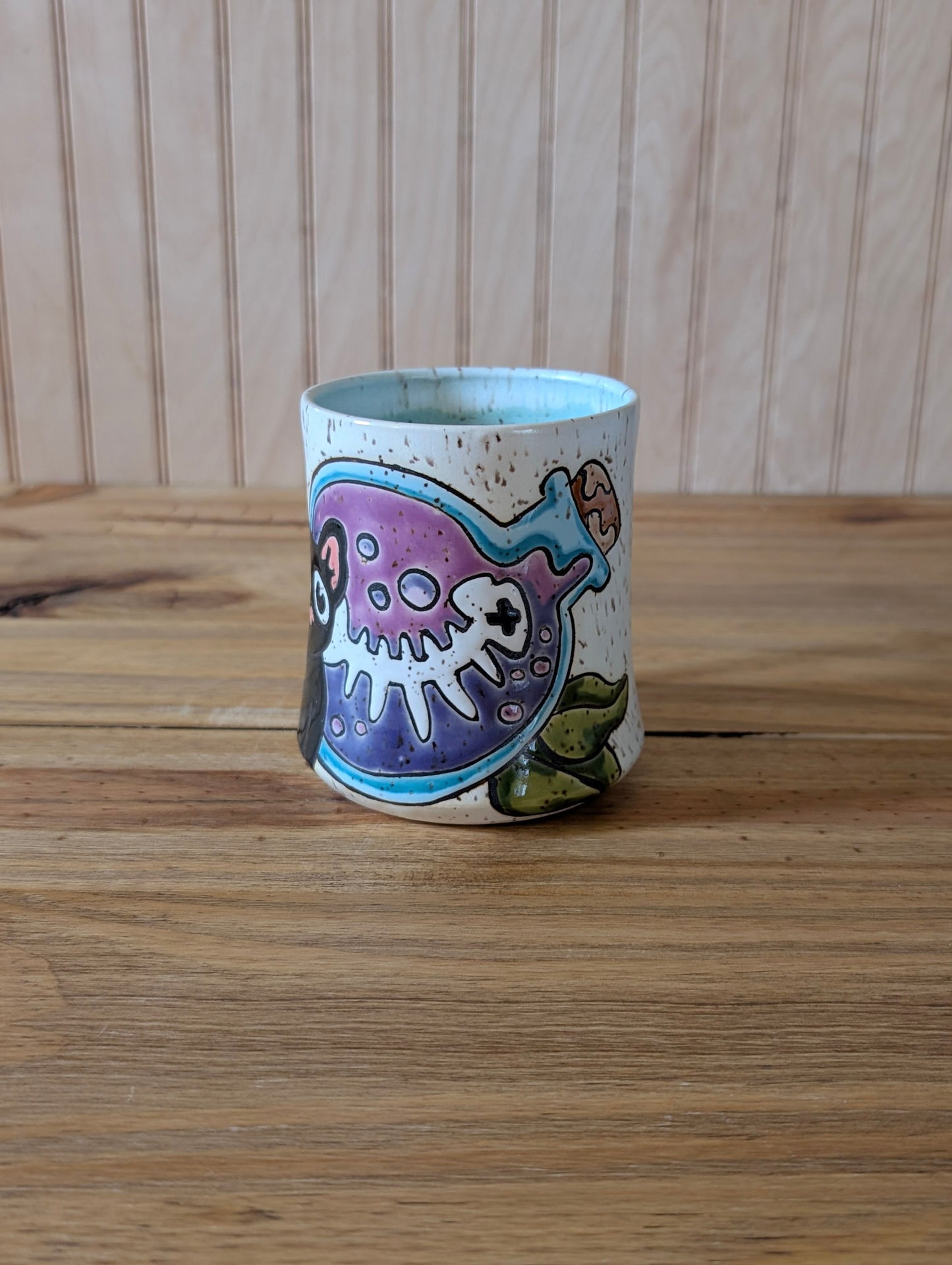 cat and fishbone potion bottle