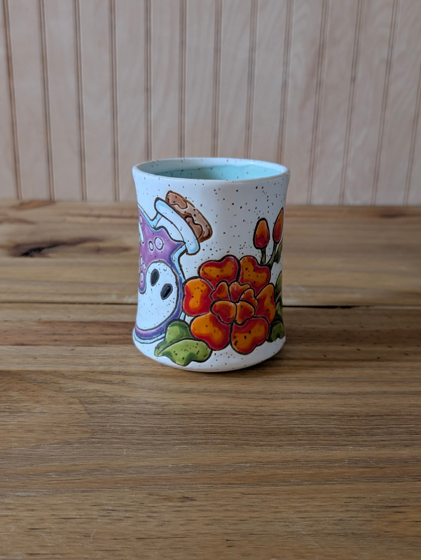 potion bottle with ghost and death's head hawk-moth