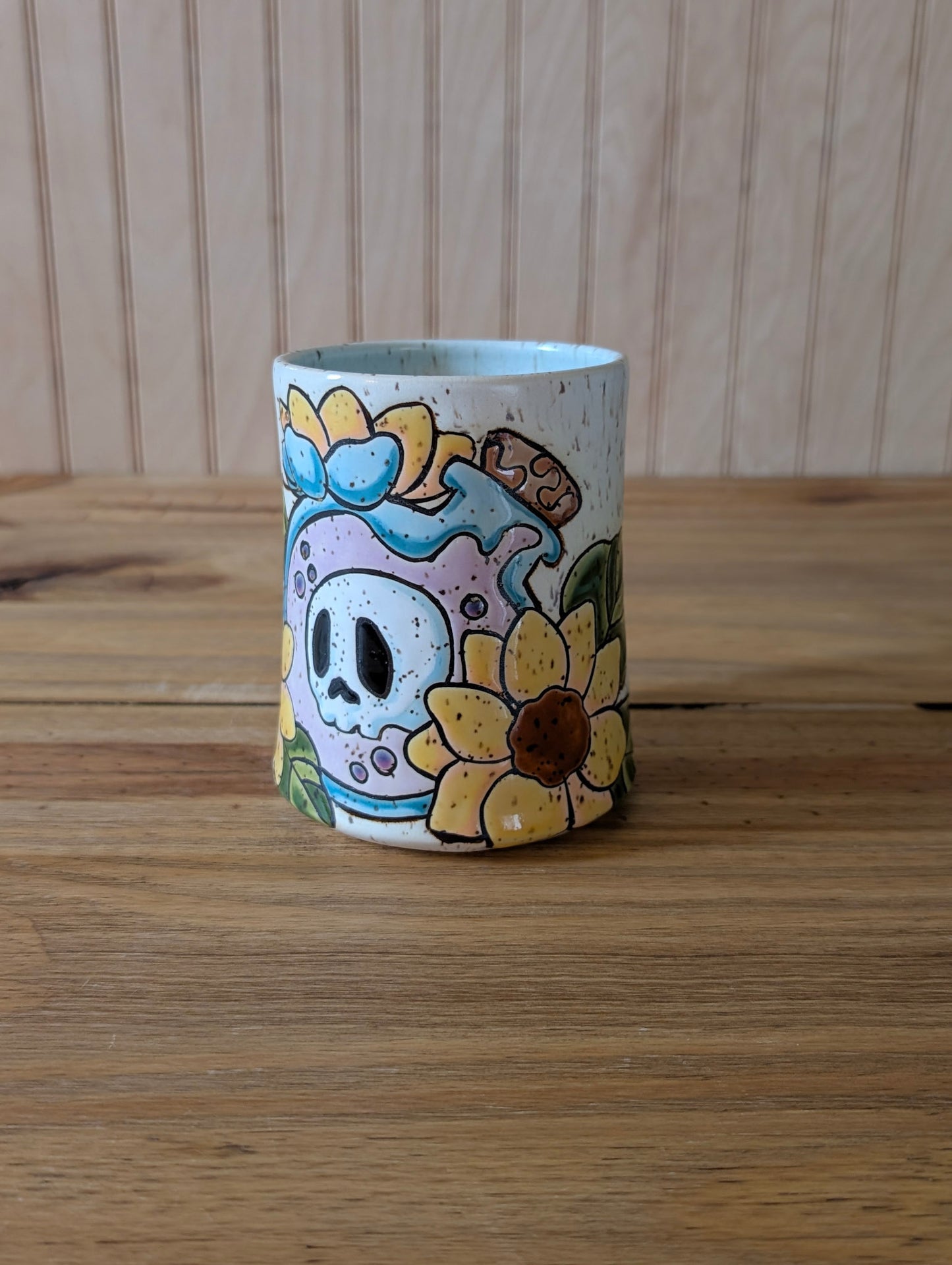 potion bottle with trapped skull and sunflowers