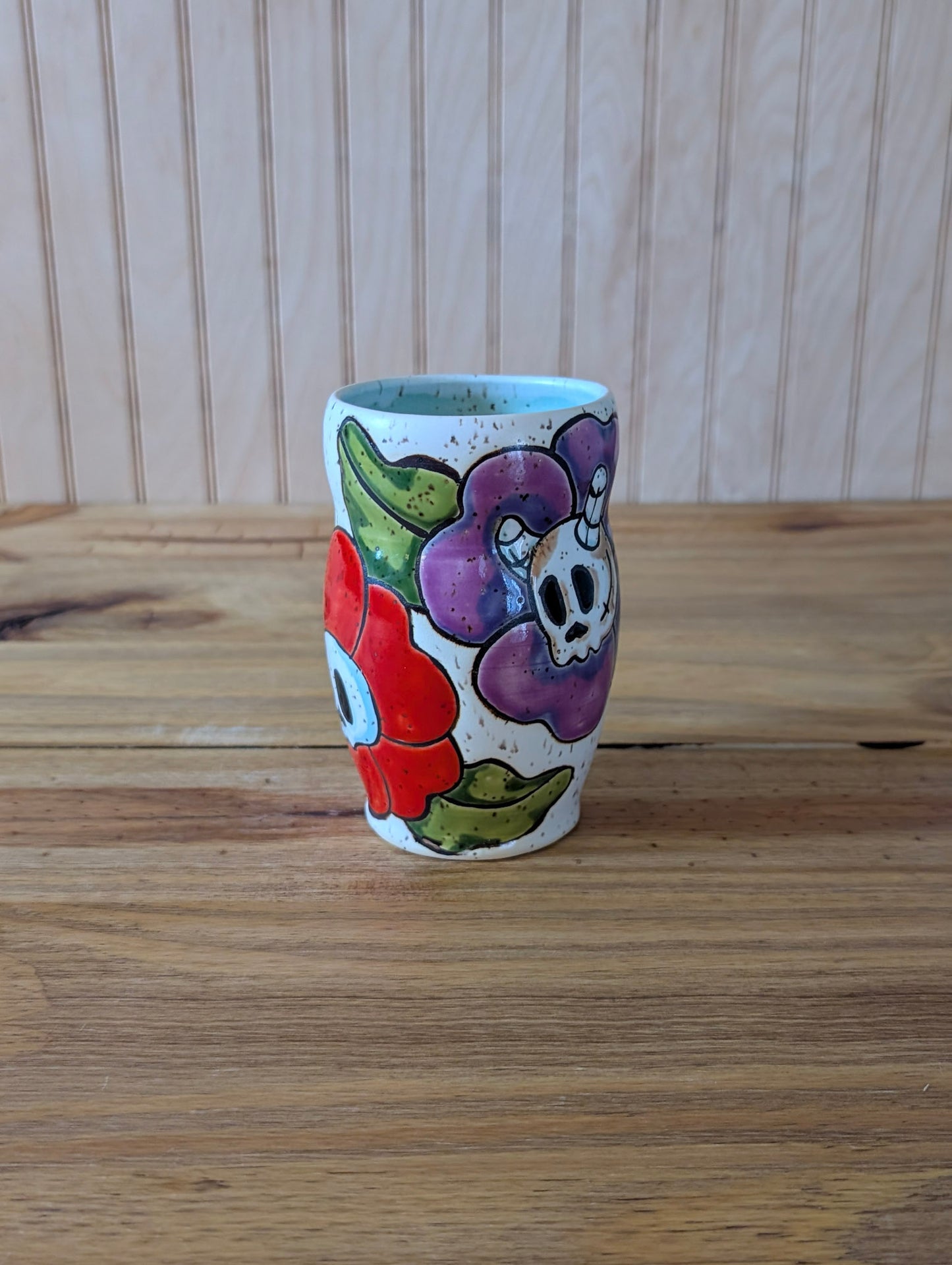 skull and horned skull flower cup