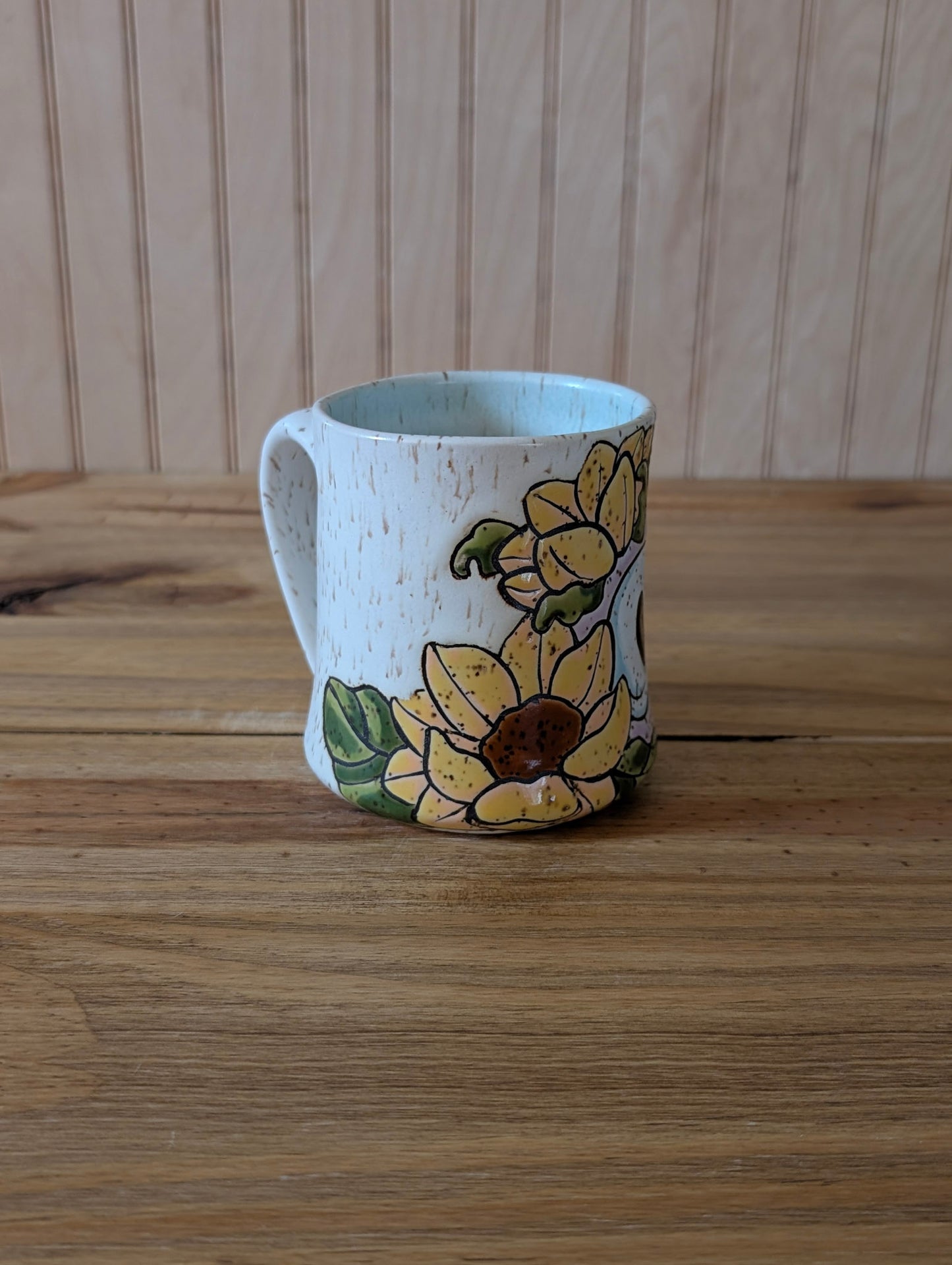 Potion bottle with skull with sunflower mug