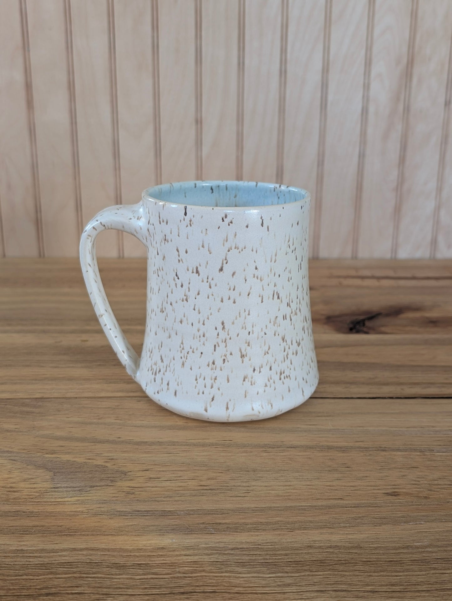 holly emblem mug two