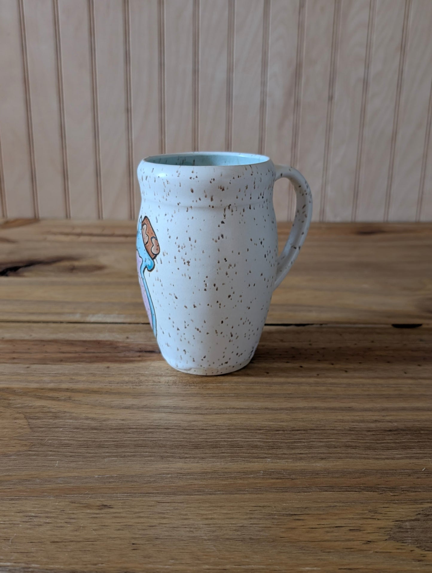 cat and fishbone potion bottle mug