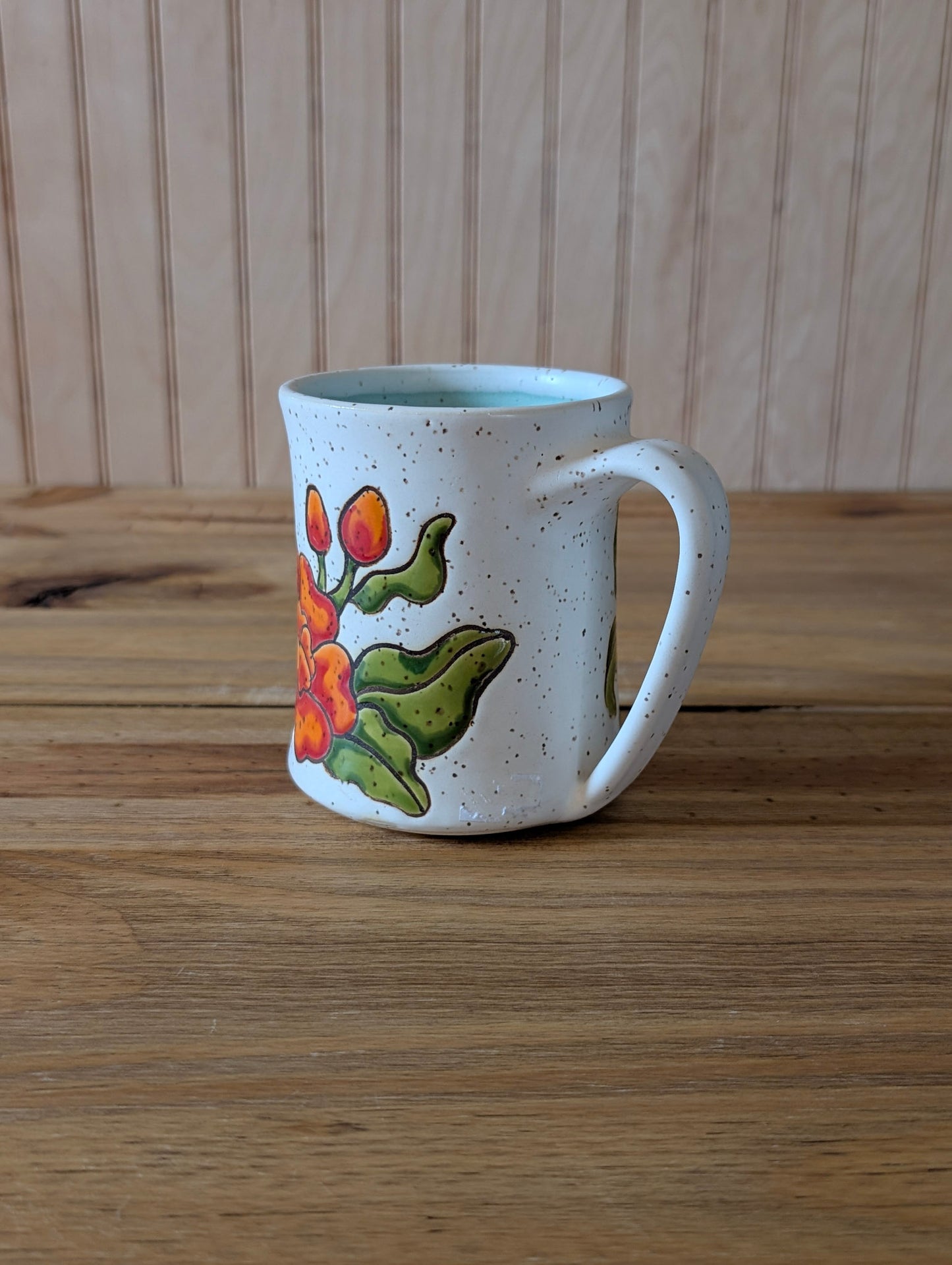 potion bottle with ghost and death's head hawk-moth