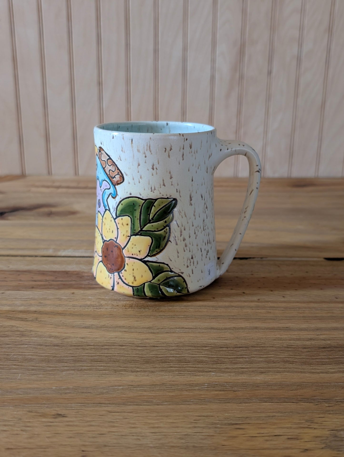 potion bottle with trapped skull and sunflowers