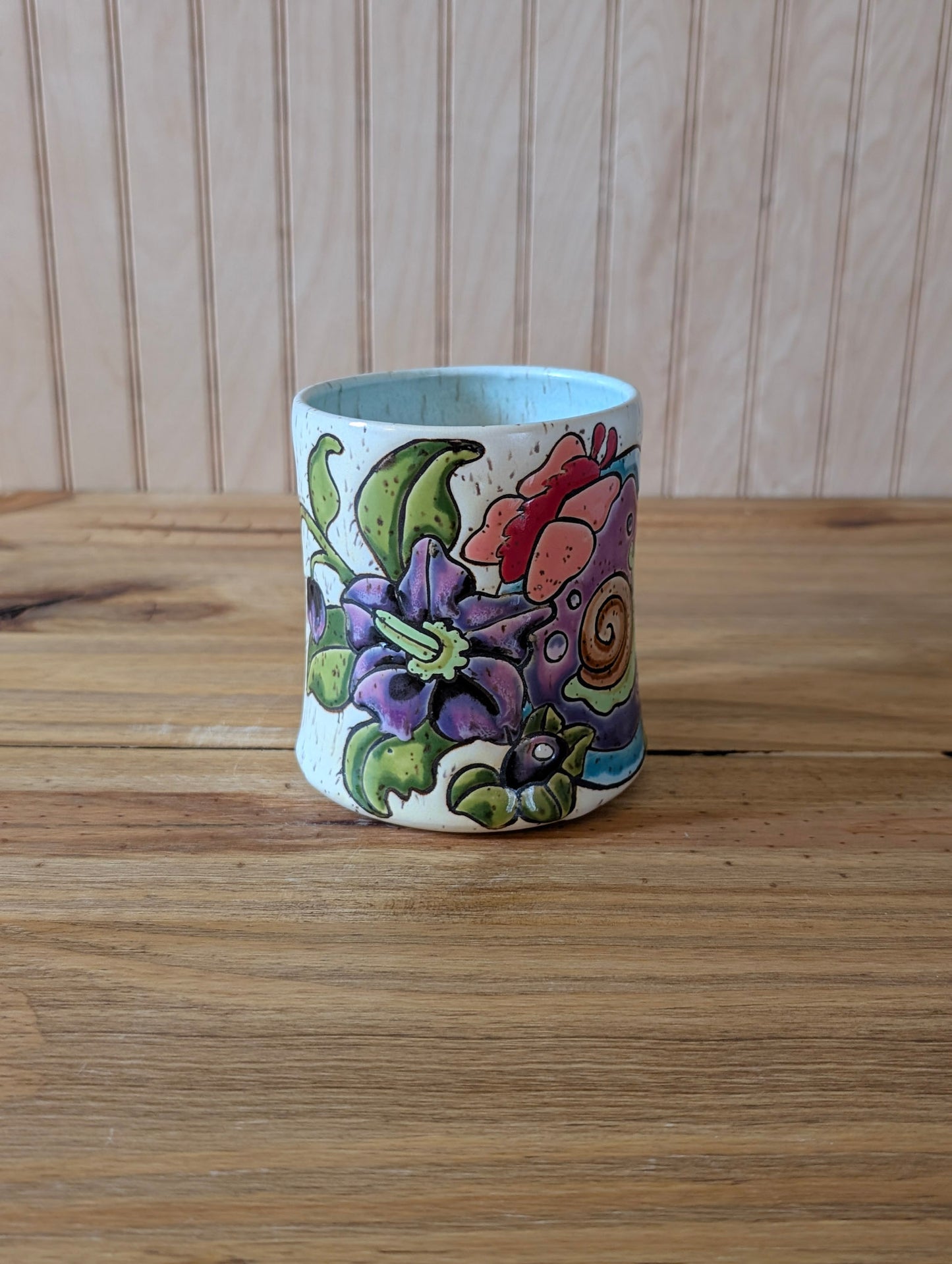 potion bottle with trapped snail