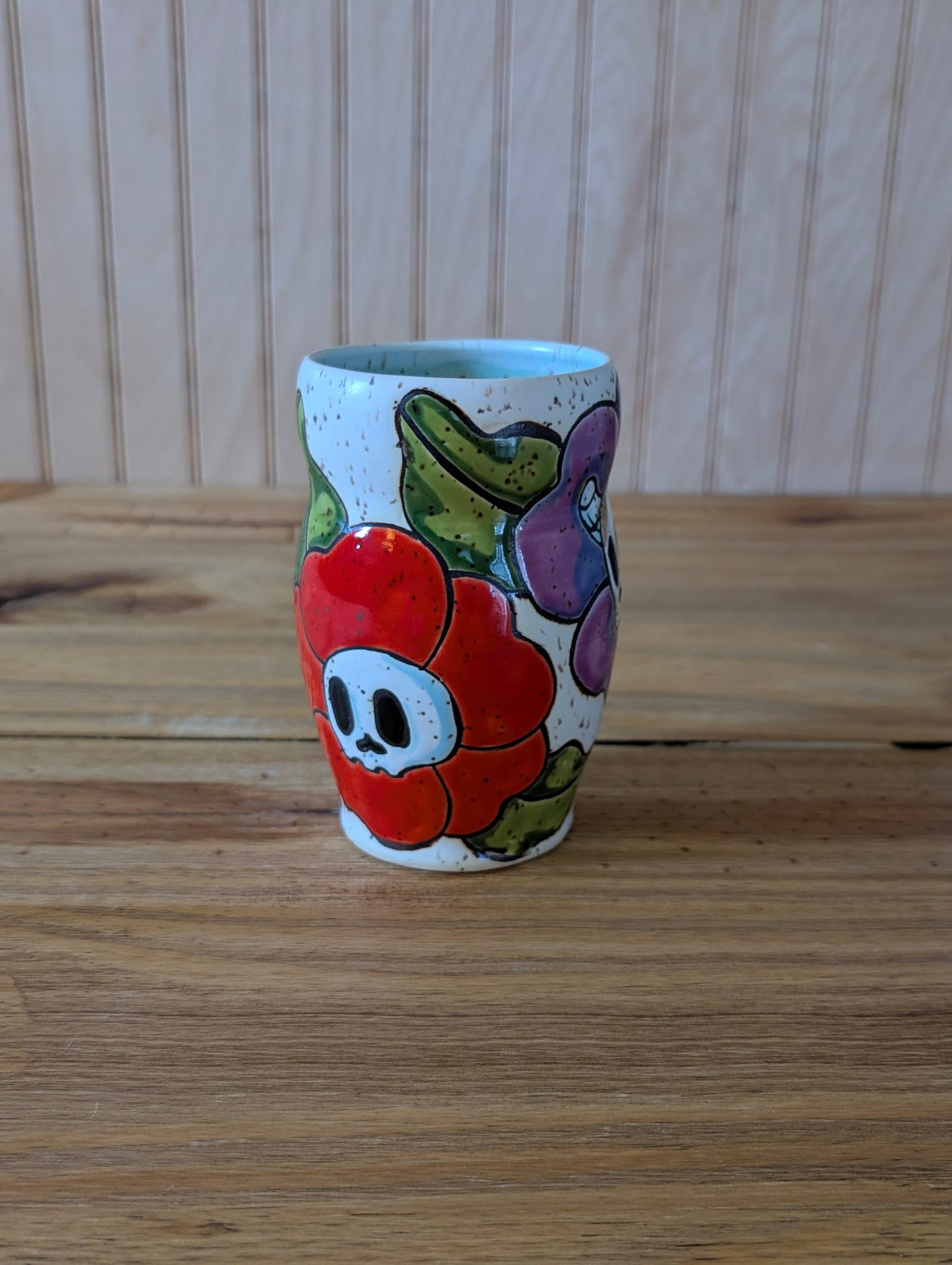 skull and horned skull flower cup