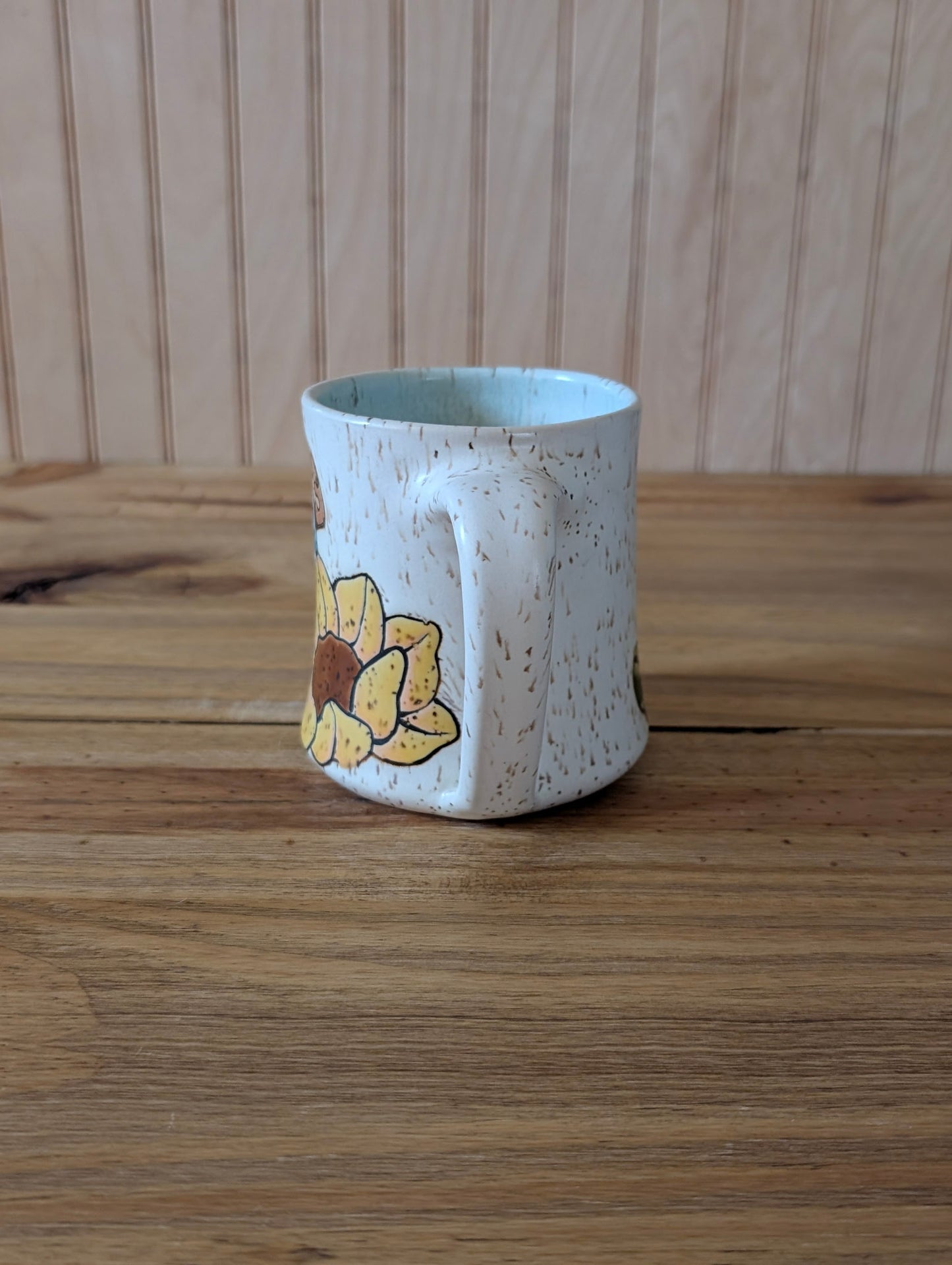 Potion bottle with skull with sunflower mug