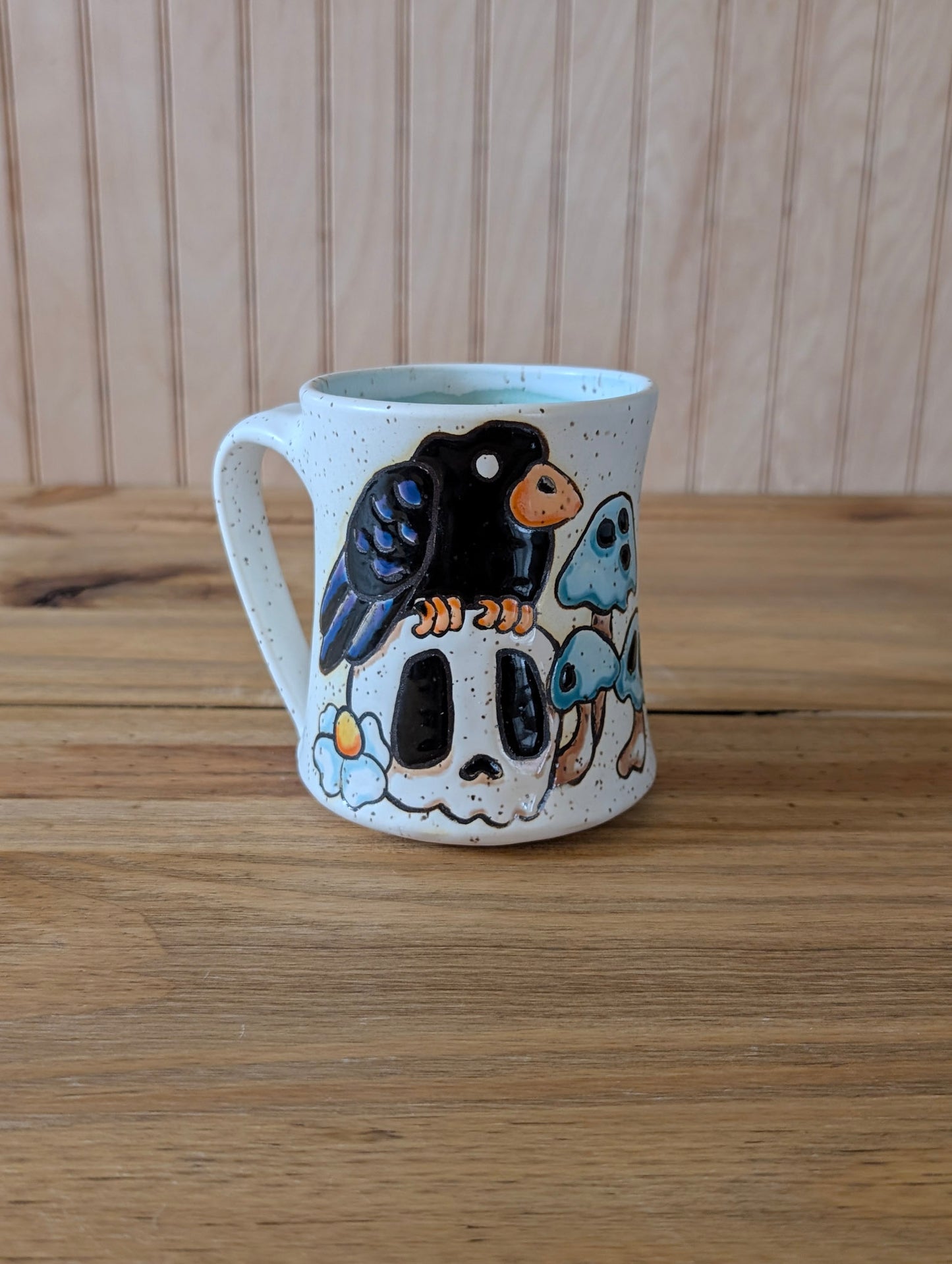 crow skull mug