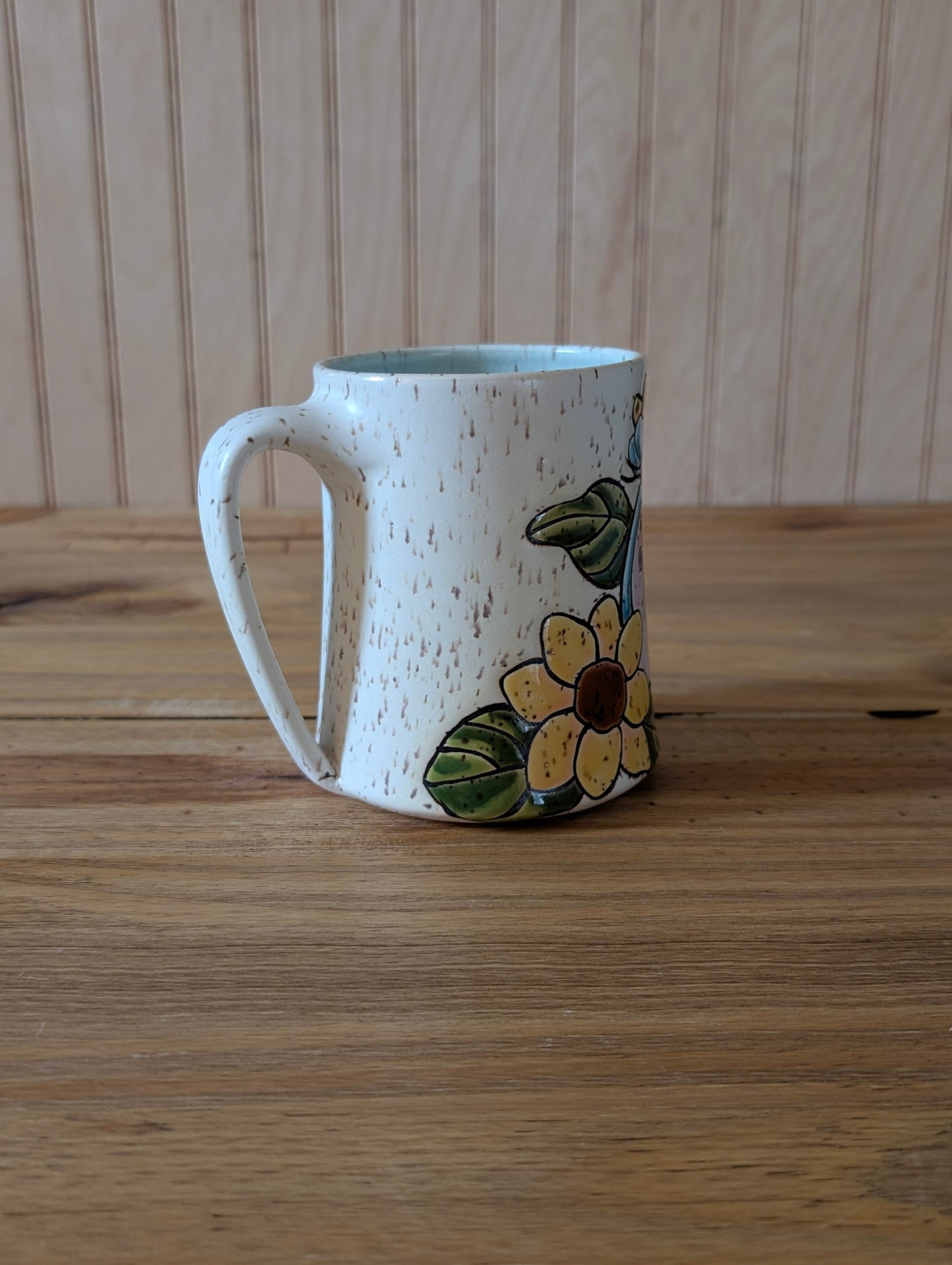 potion bottle with trapped skull and sunflowers