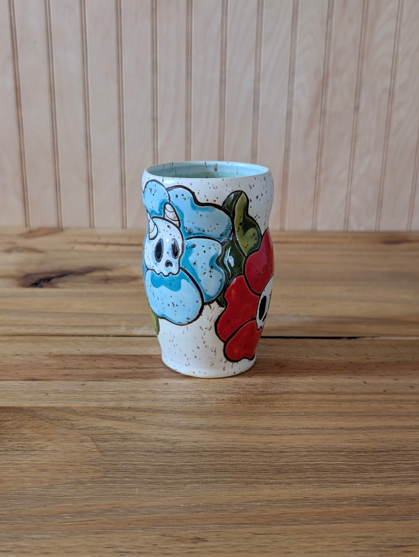 skull and horned skull flower cup