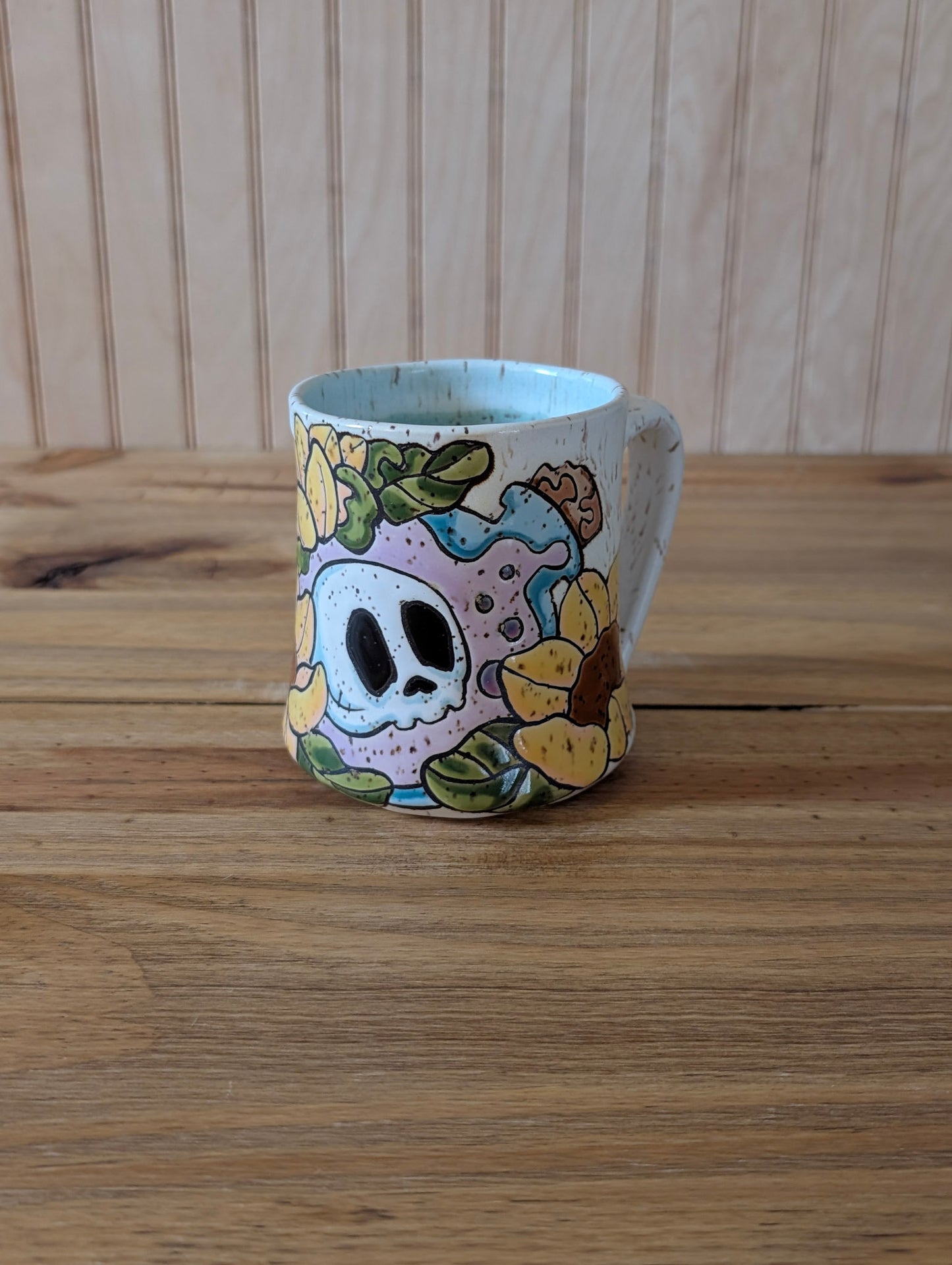 Potion bottle with skull with sunflower mug