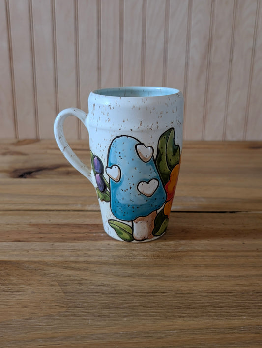 floral and mushroom wraparound design mug